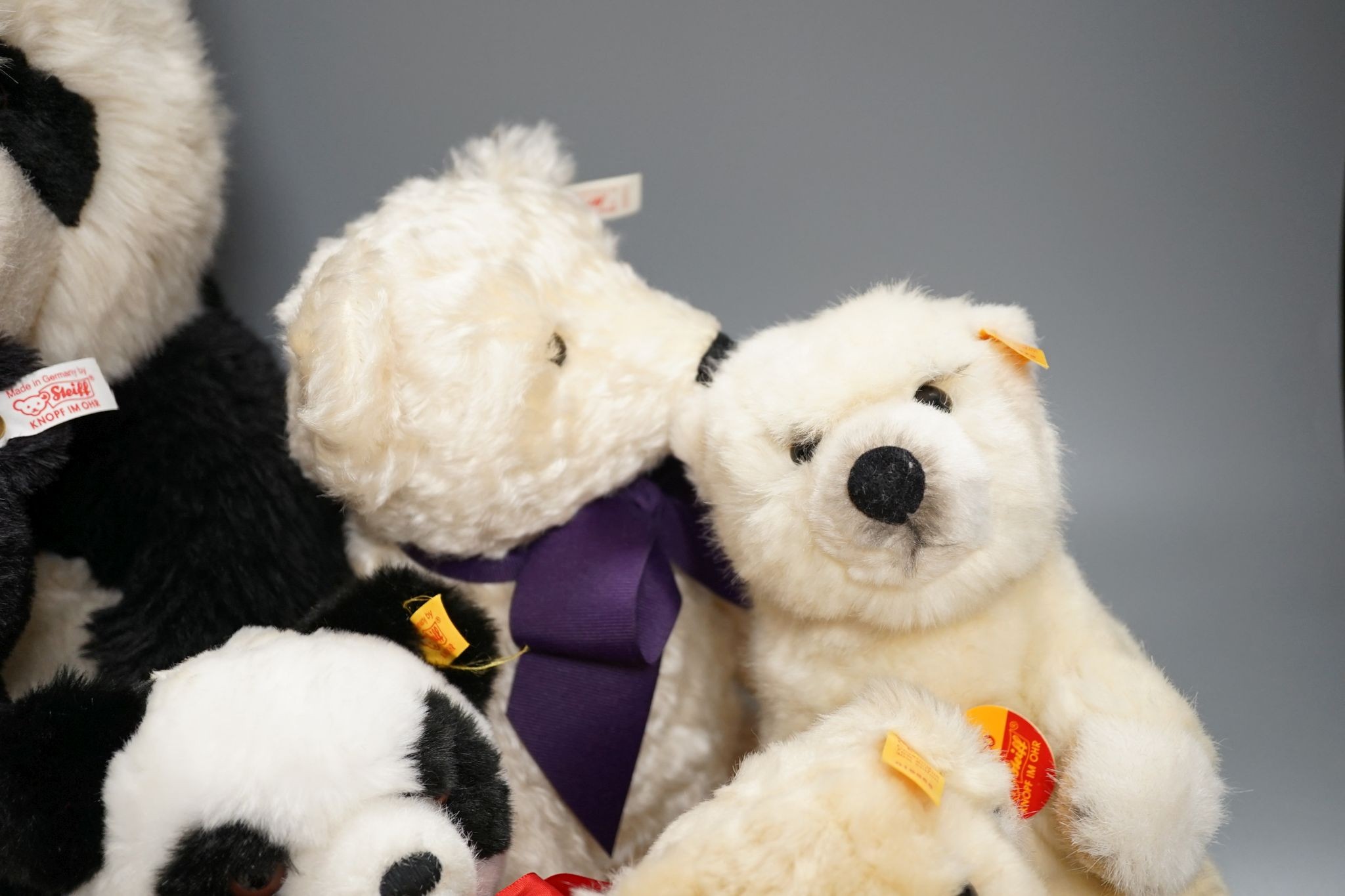 Four post war Steiff animals with a 'Pat and Nora' Limited Edition Steiff with parasol but no box and a white Limited Edition Steiff bear with white label for Hamleys